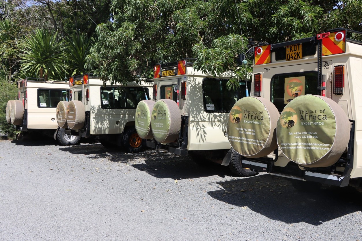 IMG_9133-scaled (1) (1) Alt description: “The Out Of Africa Experience safari tour vans lined up and ready for wildlife adventures across Kenya, showcasing a trusted safari tour operator in Nairobi.”